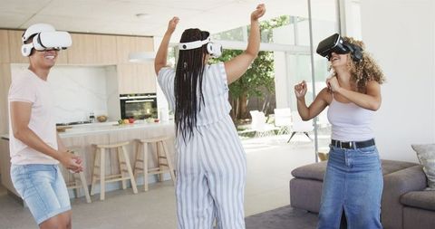 Joyful Multiracial Friends Experiencing Virtual Reality at Home - Download Free Stock Images Pikwizard.com