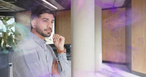 Business Professional Contemplating in Modern Office Space