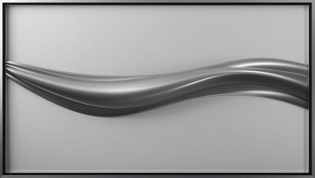 Minimalist satin silver ribbon sculpture on framed wall with monochrome flowing curves