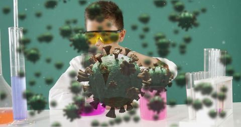 Child scientist in a laboratory with colorful chemical experiments