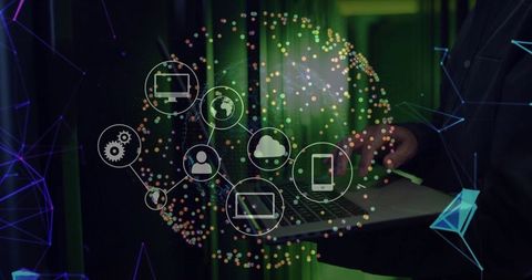 IT Engineer Typing on Laptop in Digital Data Center Environment