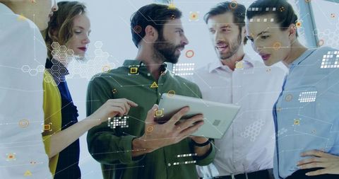 Business team collaborating around tablet with augmented data overlays and analytics dashboard