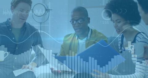 Colleagues Analyzing Financial Data at Meeting Table