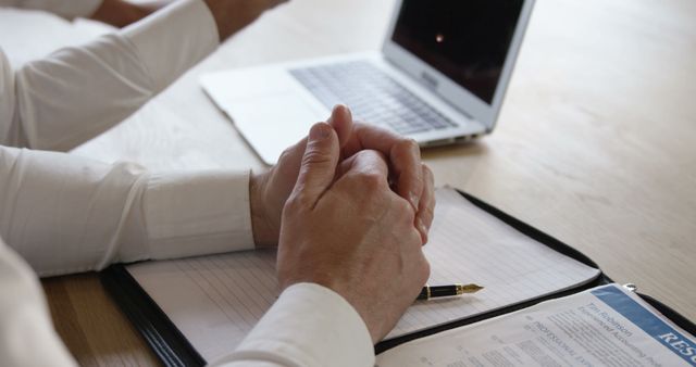 Business Professionals Reviewing Resume and Notes during Meeting - Download Free Stock Images Pikwizard.com