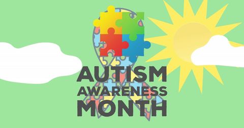 Autism awareness month puzzle ribbon on green background