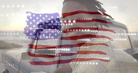 Patriotic Road Trip: American Flag Overlaid on Beach Traveler