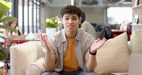 Young Professional Navigating Work in Modern Office Environment