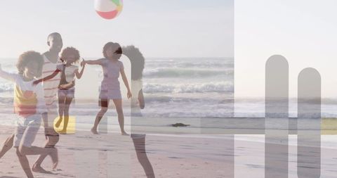 Family Enjoys Beach Ball Game on Sunny Seaside