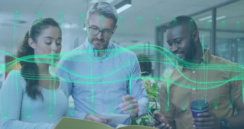 Diverse Team Analyzing Digital Data Innovation Concepts