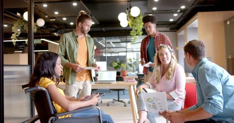 Inclusive Office Meeting with Diverse Team Collaborating