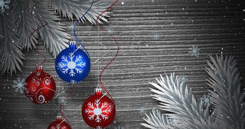 Festive Wooden Background with Falling Snow and Bauble Decorations