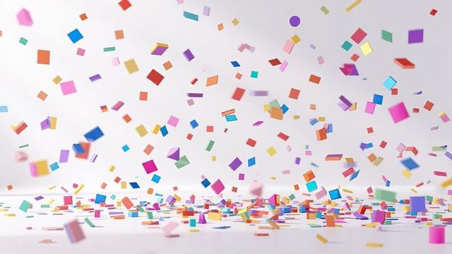 Dynamic colorful confetti floating on white background