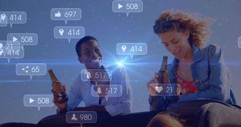 Black and white friends sharing beers under starry sky with social media notifications overlay