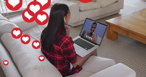 Smiling Woman Enjoying Video Call with Social Media Notification Icons