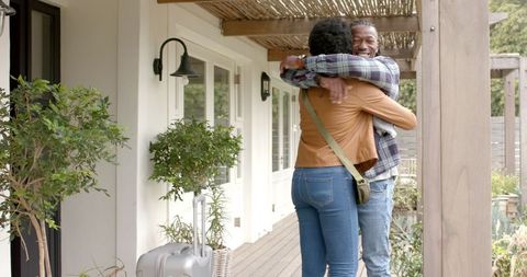 Welcoming Embrace On Wooden Porch