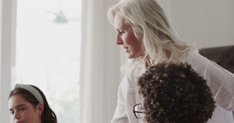 Diverse Women Planning Wedding, Discussing Preparations at Table