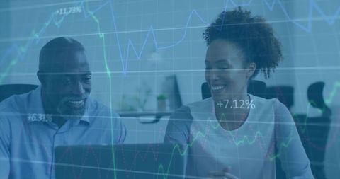 Business Team Looking at Financial Data with Chart Overlay