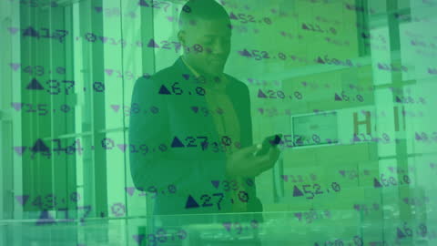 Businessman Engaging with Mobile Technology Amid Stock Market Data