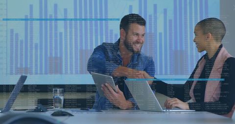 Business Team Analyzing Financial Data Projection in Modern Office