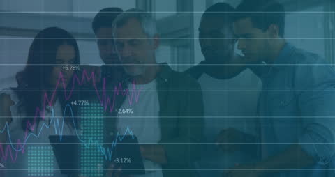 Diverse Business Team Analyzing Digital Data Trends in Office