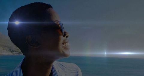 Stylish Woman Enjoying Sunny Day by the Seaside