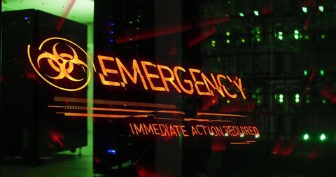 Emergency Alert Displayed in Dark Server Room Environment