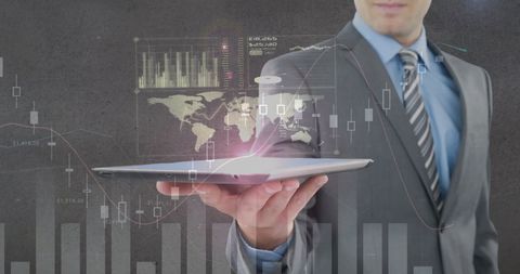 Businessman Analyzing Financial Data with Futuristic Tablet
