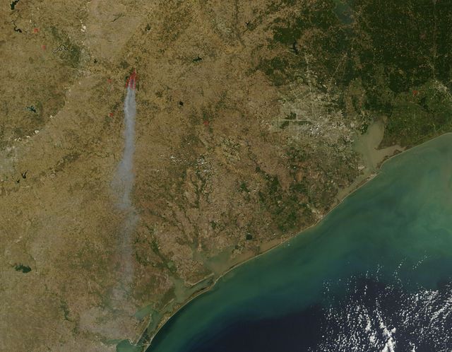 NASA satellite image showing the fires in Bastrop County Texas on September 5, 2011 at 17:05 UTC.  Credit: NASA/GSFC/Jeff Schmaltz/MODIS Land Rapid Response Team  <b><a href="http://www.nasa.gov/centers/goddard/home/index.html" rel="nofollow">NASA Goddard Space Flight Center</a></b> enables NASA’s mission through four scientific endeavors: Earth Science, Heliophysics, Solar System Exploration, and Astrophysics. Goddard plays a leading role in NASA’s accomplishments by contributing compelling scientific knowledge to advance the Agency’s mission.  <b>Follow us on <a href="http://twitter.com/NASA_GoddardPix" rel="nofollow">Twitter</a></b>  <b>Like us on <a href="http://www.facebook.com/pages/Greenbelt-MD/NASA-Goddard/395013845897?ref=tsd" rel="nofollow">Facebook</a></b>  <b>Find us on <a href="http://instagrid.me/nasagoddard/?vm=grid" rel="nofollow">Instagram</a></b>