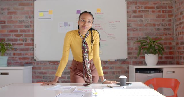 Confident Woman Leading Business Meeting in Modern Office - Download Free Stock Images Pikwizard.com