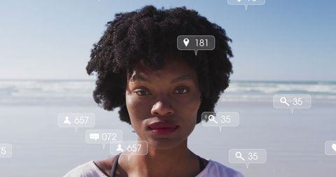 digital data metrics surrounding woman on beach - Download Free Stock Images Pikwizard.com