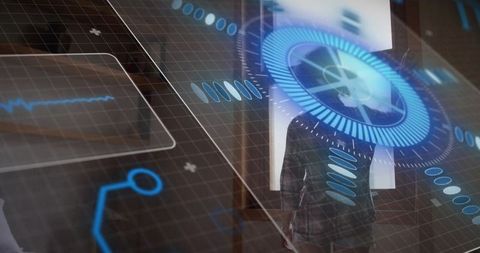 Standing woman facing holographic blue HUD interface in dim room with grid overlay