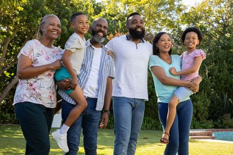 Smiling Multigenerational Family Enjoying Outdoor Time Together