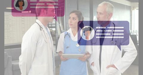 Healthcare Professionals Discussing Patient Care with Digital Technology