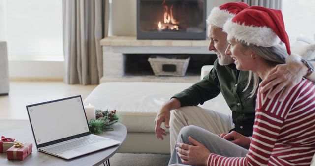 Senior Couple Video Calling on Laptop During Christmas - Download Free Stock Images Pikwizard.com