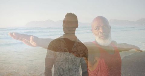 Double Exposure Two Men Standing with Outstretched Arms on Coastal Horizon
