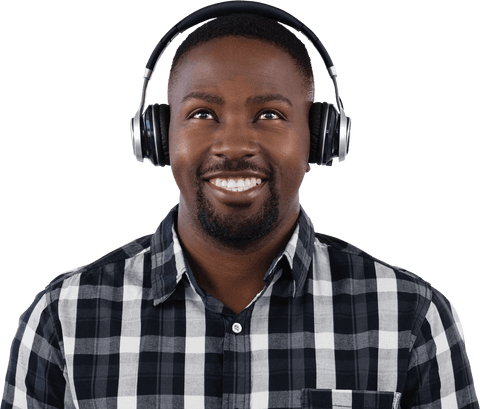 Joyful Man Wearing Headphones Smiling Upwards with Checkered Shirt - Download Free Stock Videos Pikwizard.com