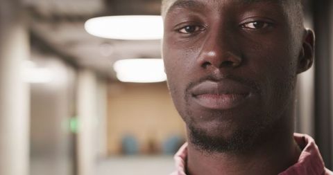 Confident executive standing in modern office educational setting