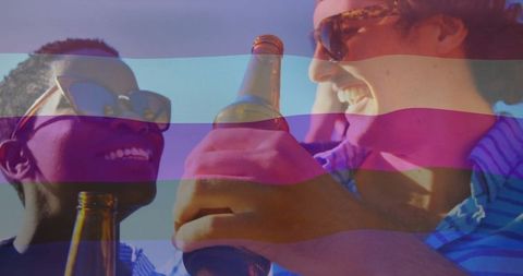 Two friends smiling and toasting with glass beer bottles under bright sky capturing essence of camaraderie and leisure. Perfect symbol of joy, diversity, and casual gatherings on a sunny day. Ideal for campaigns focused on summer fun, youthful vigor, friendships, and casual hangouts in lifestyle blogs, social media, and advertising pertaining to relaxation and joyous settings.