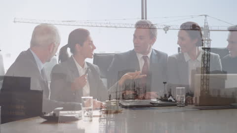 Diverse Business Team Meeting with Construction Overlay