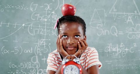 Thoughtful African American Girl in Classroom with Math Formulas - Download Free Stock Images Pikwizard.com