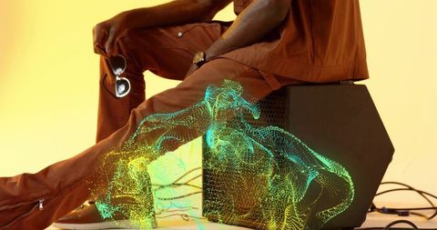 Man in stylish rust outfit with wireframe projection