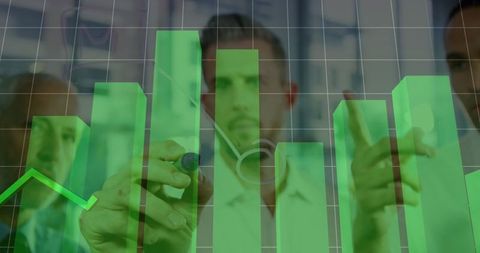 Diverse team analyzing statistical data on glass board