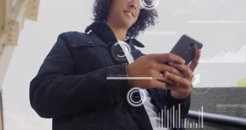 Man Analyzing Financial Data on Smartphone with Holographic Graphics