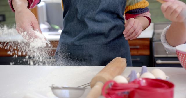 Baker Sprinkling Flour on Kitchen Counter - Download Free Stock Images Pikwizard.com