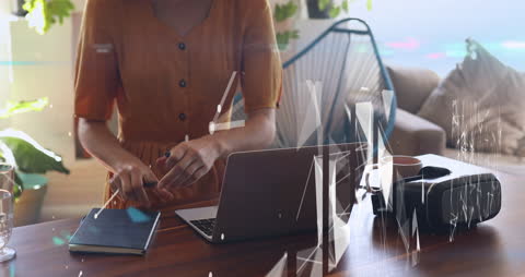 Modern Workspace Featuring Laptop and Virtual Reality Elements