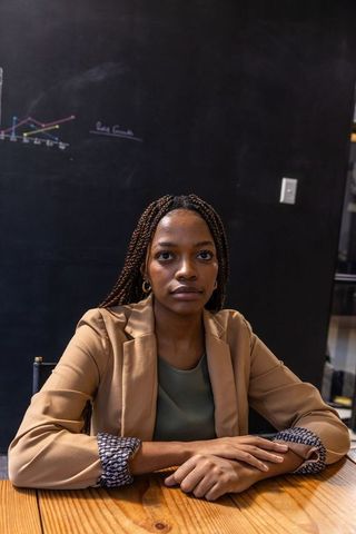 Professional Leader in Modern Office Environment with Graph Background