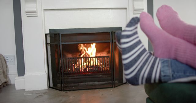 Couple Relaxing by Fireplace in Cozy Home - Download Free Stock Images Pikwizard.com