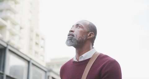 African American Man Exploring Urban City Streets in Daylight