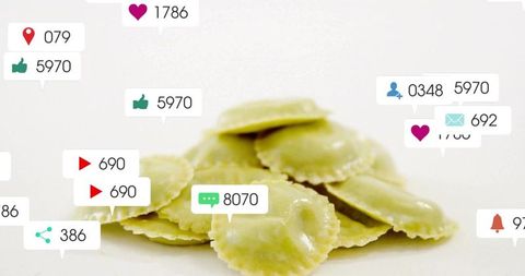 Social media engagement symbols surround yellow ravioli concept