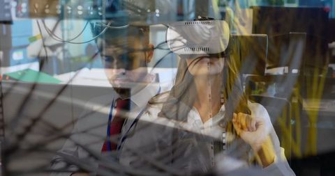 Business Professionals Combining Virtual Reality and Data Analysis